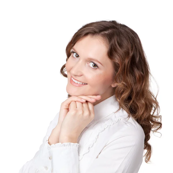 Portrait of pretty young businesswoman with hand on chin and smi — Stock Photo, Image