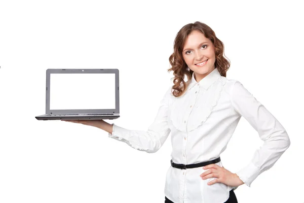 Portrait of a pretty young businesswoman holding a laptop — Stock Photo, Image