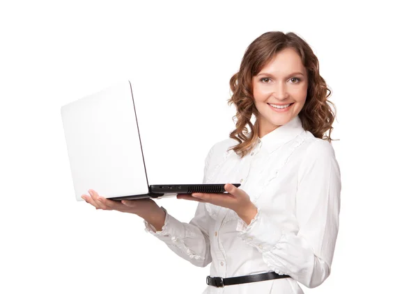 Portrait of a pretty young businesswoman holding a laptop — Stock Photo, Image