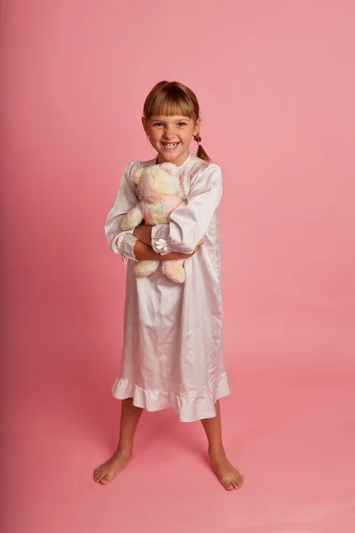 Little girl with a teddy bear — Stock Photo, Image