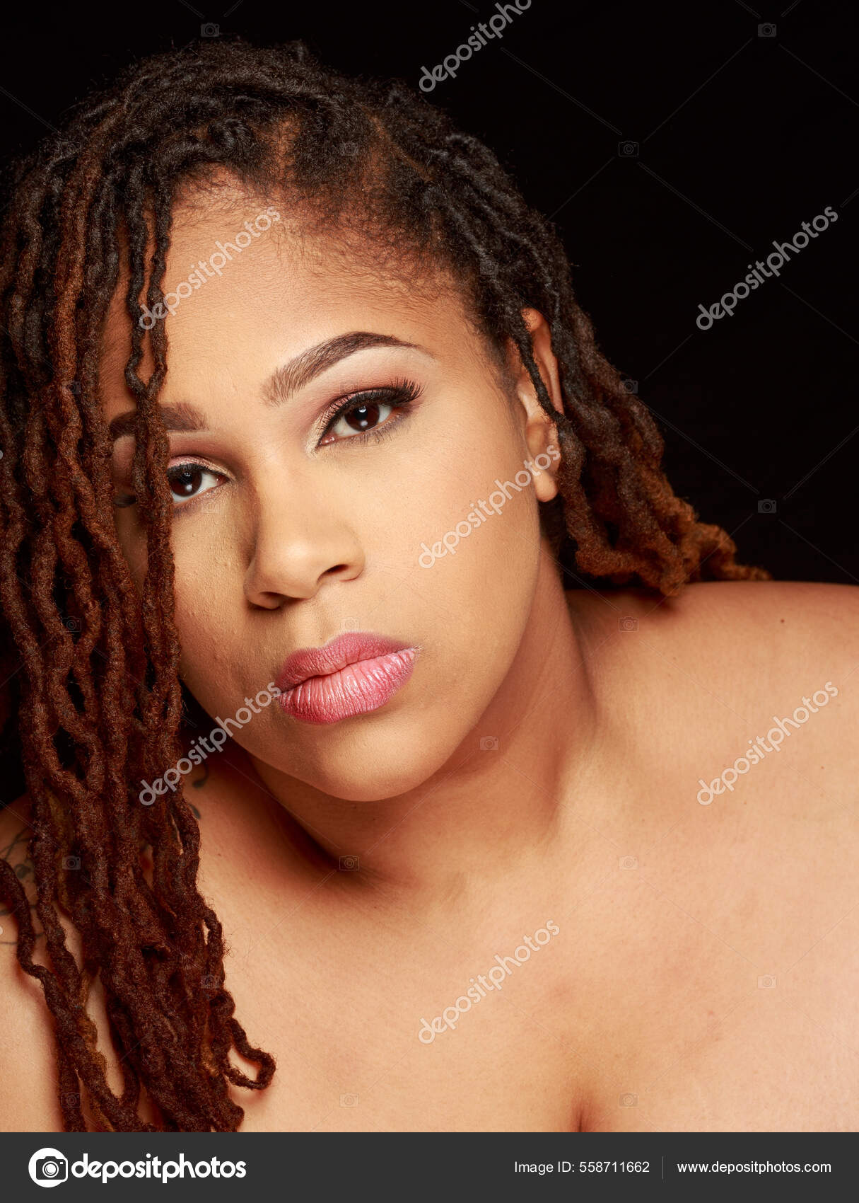 Plus Size African American BBW Woman posing in the studio Stock Photo