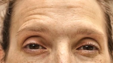 Mature adult woman looking at the camera