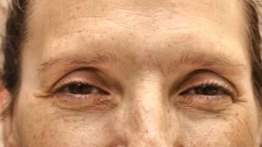 Mature adult woman looking at the camera
