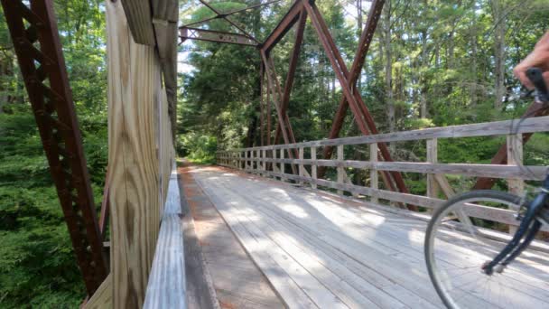 Man Riding His Bike Old Railroad Bridge High Quality Footage — Wideo stockowe