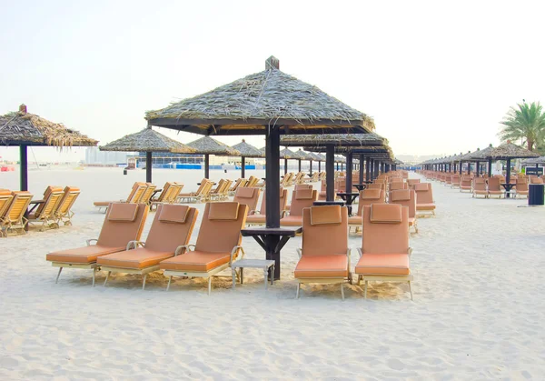 Chaise lounge on a beach in Dubai — Stock Photo, Image