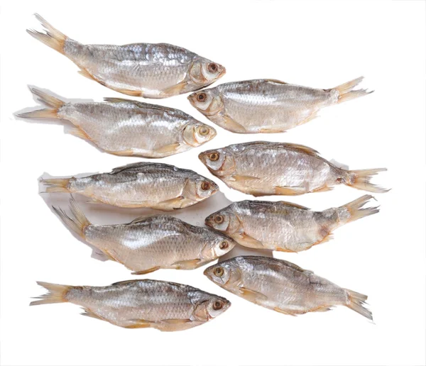 Tørket fisk på et bord – stockfoto