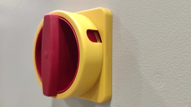 The hand turns on the red switch. The hand turns the red switch. Electric switch — Stock Video