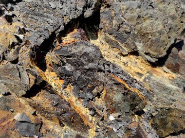 Jeodezi. Taş dokusu. Kaya kahverengi ve kırmızıdır. Mineral arka plan. Doğal malzemelerden dizayn.