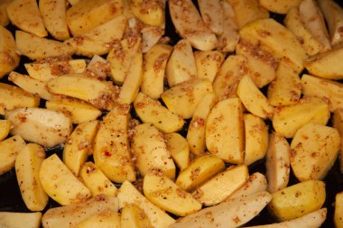 Fırında patates. Altın doku. Patatesler fırında.