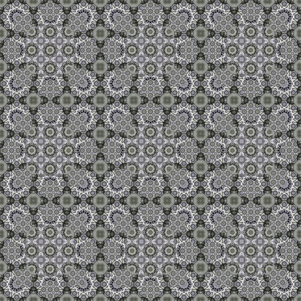 Seamless pattern. Small pattern of geometric flowers. Patterns for fabric and clothing