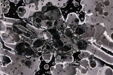 Karanlık soyut dokulu arka planlar. Lekeler ve lekeler. Alkol mürekkebi.