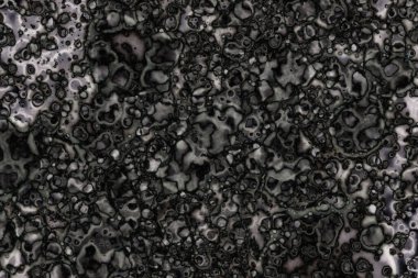 Karanlık soyut dokulu arka planlar. Lekeler ve lekeler. Alkol mürekkebi.