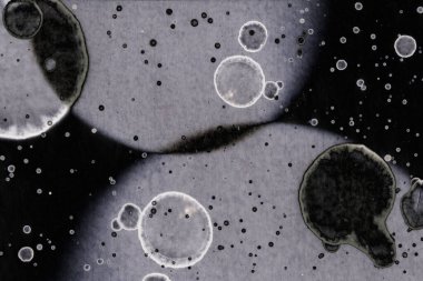 Karanlık soyut dokulu arka planlar. Lekeler ve lekeler. Alkol mürekkebi.