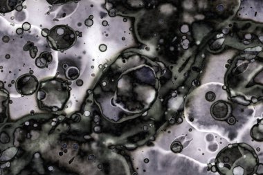 Karanlık soyut dokulu arka planlar. Lekeler ve lekeler. Alkol mürekkebi.