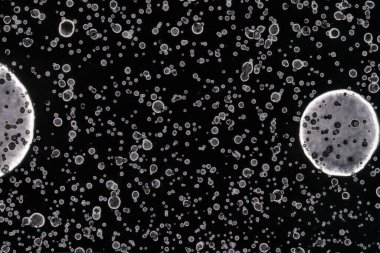 Karanlık soyut dokulu arka planlar. Lekeler ve lekeler. Alkol mürekkebi.