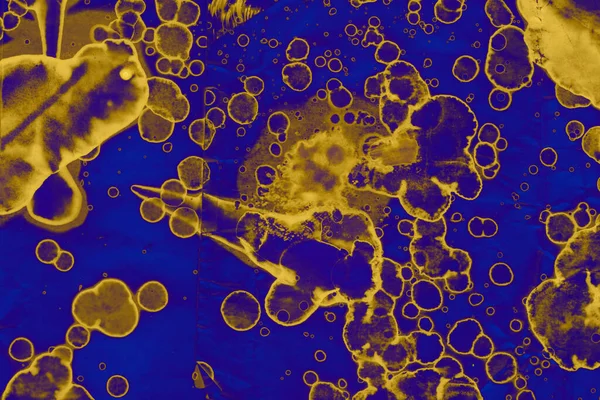 Soyut mavi sarı arka plan. Lekeler ve kabarcıklar. Alkol mürekkebi sanatı. Sembol.