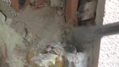 Dismantling the wall with a perforator. Repair and finishing. A jackhammer breaks the hole. High quality FullHD footage