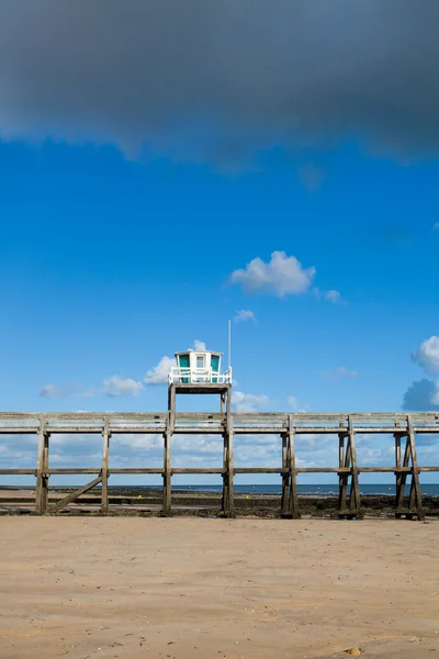 Jetty pontoon luc sur mer — Stock Photo, Image