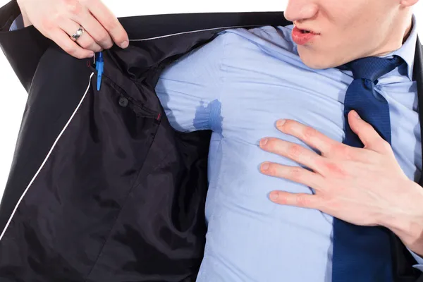 Homem de negócios com sudorese sob axila em camisa azul — Fotografia de Stock