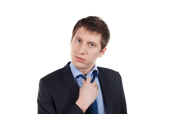 Serious and tired young businessman — Stock Photo, Image