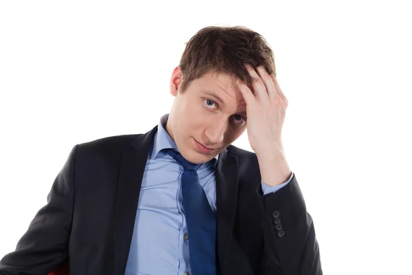 Serious and tired young businessman — Stock Photo, Image