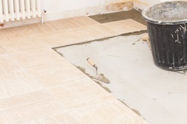 işçi 's araçları döşenir bir katta