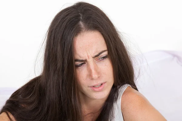 Woman wakes up with a sore head — Stock Photo, Image