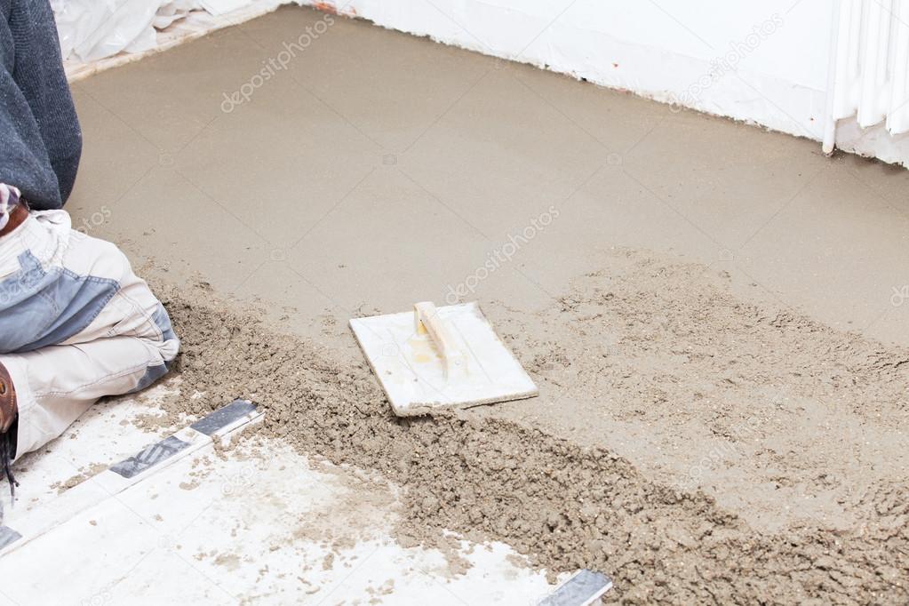 mason smooth the cement screed
