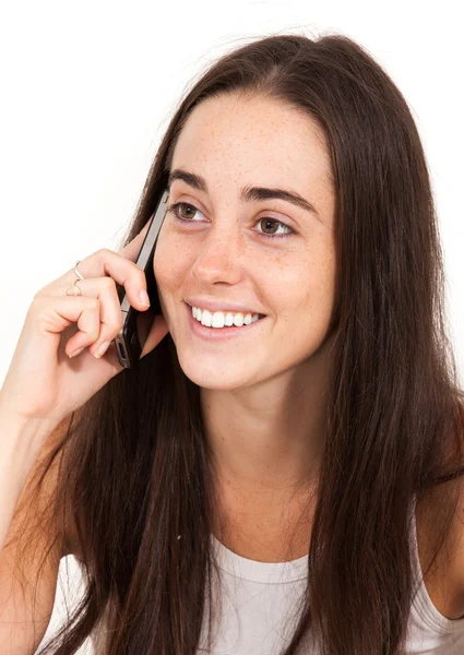 Portret van een mooie jonge vrouw op de telefoon — Stockfoto