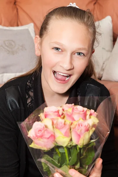 Girl with bunch of flowers — Stock Photo, Image