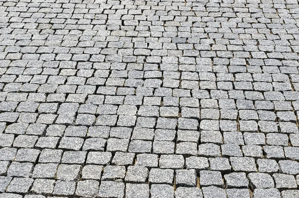 Cobbled road as background — Stock Photo, Image