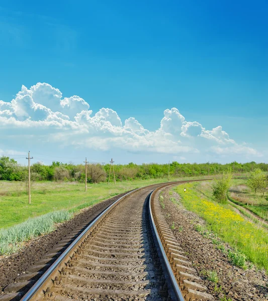 Railway goes to horizon in green landscape — Stock Photo, Image