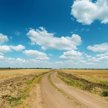 dirty road and cloudy sky
