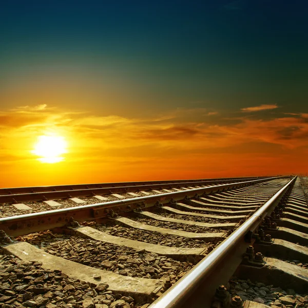 Orange sunset over railroad — Stock Photo, Image