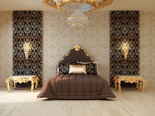 Роскошная спальня с золотой мебелью в королевском интерьере — стоковое фото
