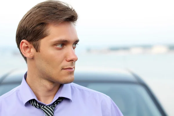 Elegant young handsome man looking away — Stock Photo, Image