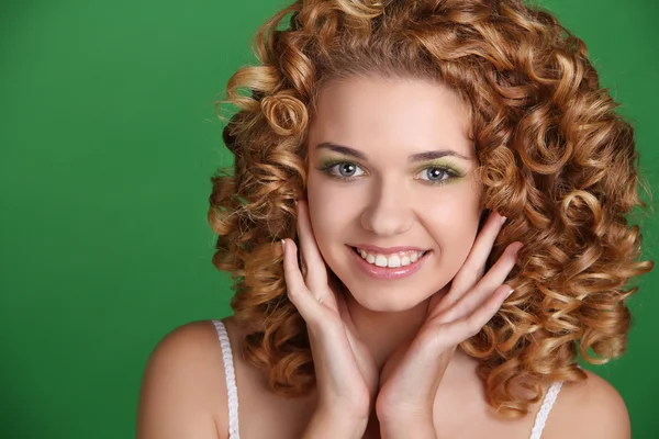 Attractive smiling woman portrait with long glossy hair over gre — Stock Photo, Image