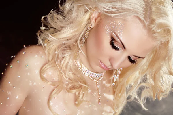 Closeup of blond sexy girl model wearing in twinkled crystals wi — Stock Photo, Image