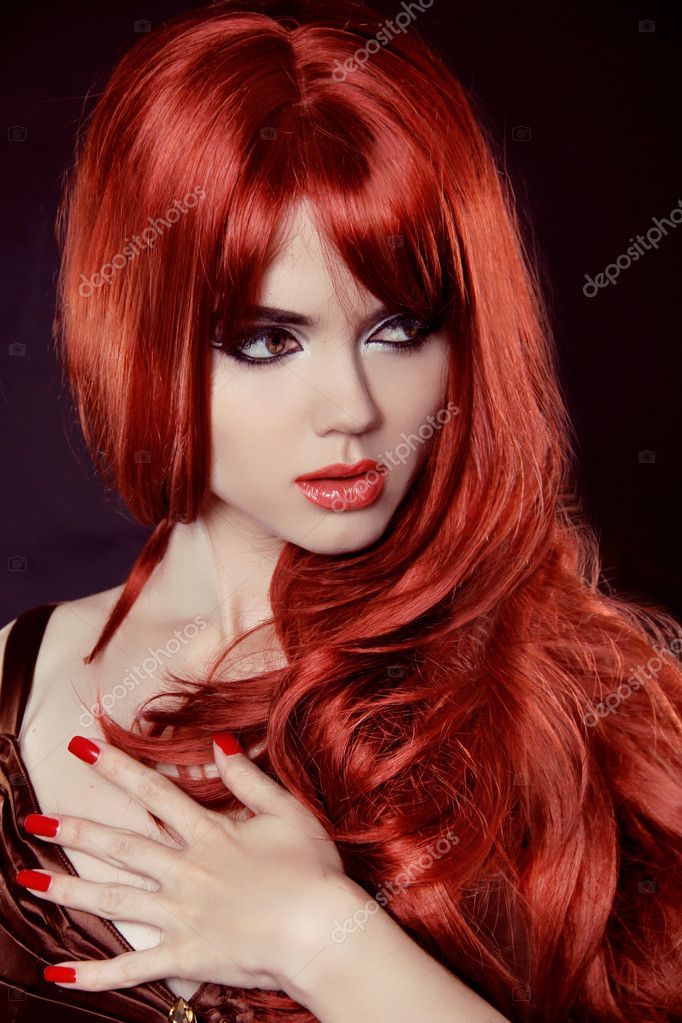 Red Hair. Fashion Girl Portrait with long Curly Hair isolated on Stock Photo  by ©VictoriaAndrea 26099321
