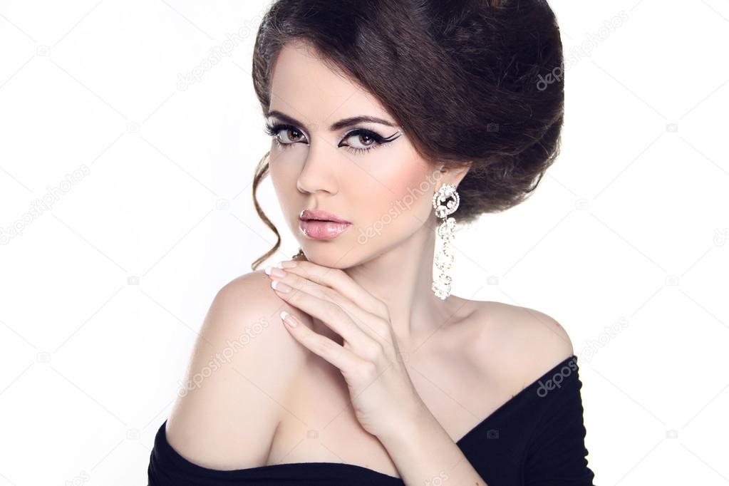 Beautiful Brunette Girl with hairstyle and make up isolated on w