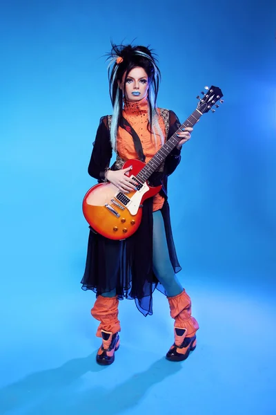 Rock girl posing with electric guitar playing hard-rock isolated — Stock Photo, Image