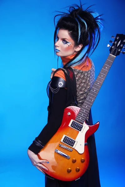 Back of Rock emo girl posing with electric guitar isolated on bl — Stock Photo, Image