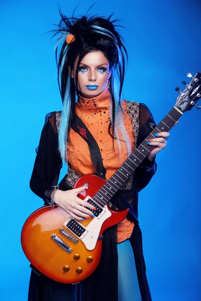 Rock girl posing with electric guitar playing hard-rock isolated — Stock Photo, Image