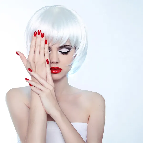 Beauty Woman portrait with makeup and red nail polish, studio sh — Stock Photo, Image