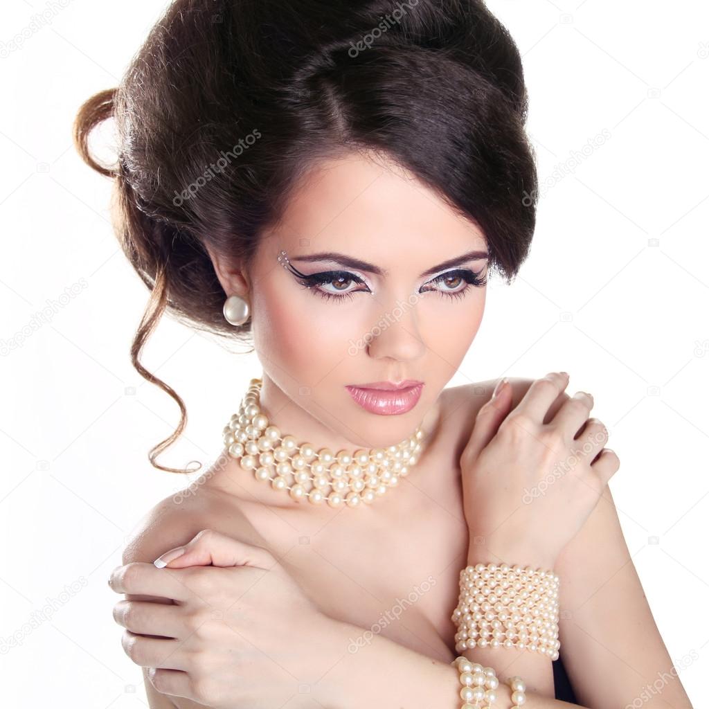 Sexy Girl. Jewelry and Hairstyle. Fashion portrait of beautiful