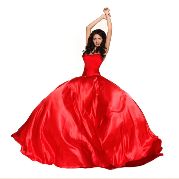 Beautiful woman wearing in magnificent red dress isolated on whi — Stock Photo, Image