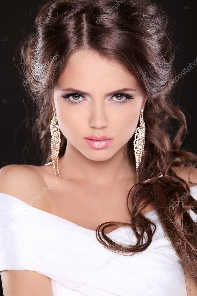 Beauty fashion girl model. Stare. Sexy brunette woman with rich