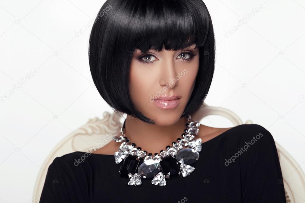 Fashion Beauty Woman Portrait. Stylish Haircut and Makeup. Hairs