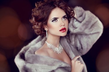 Beauty Fashion Model Woman in Mink Fur Coat. Winter Girl in Luxu clipart