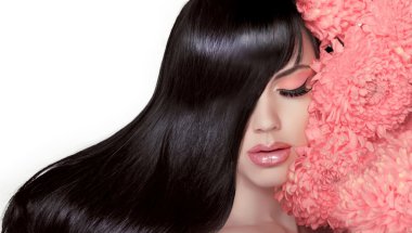 Hair Salon. Beauty Woman with Long Healthy and Shiny Smooth Blac